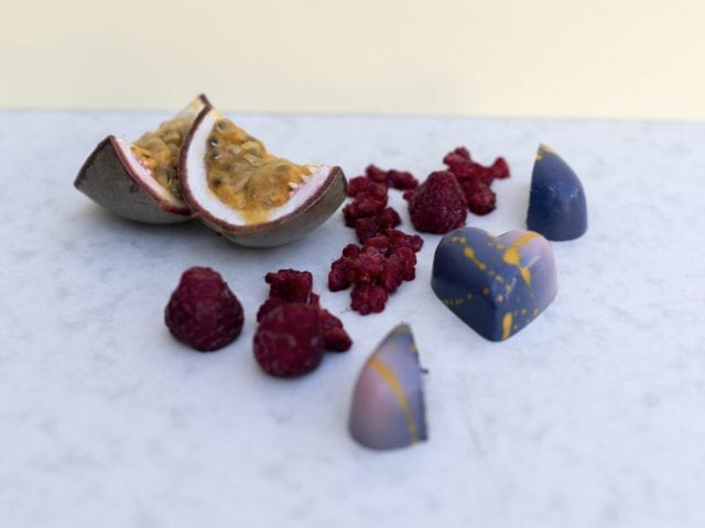 passionfruit and raspberries with chocolates